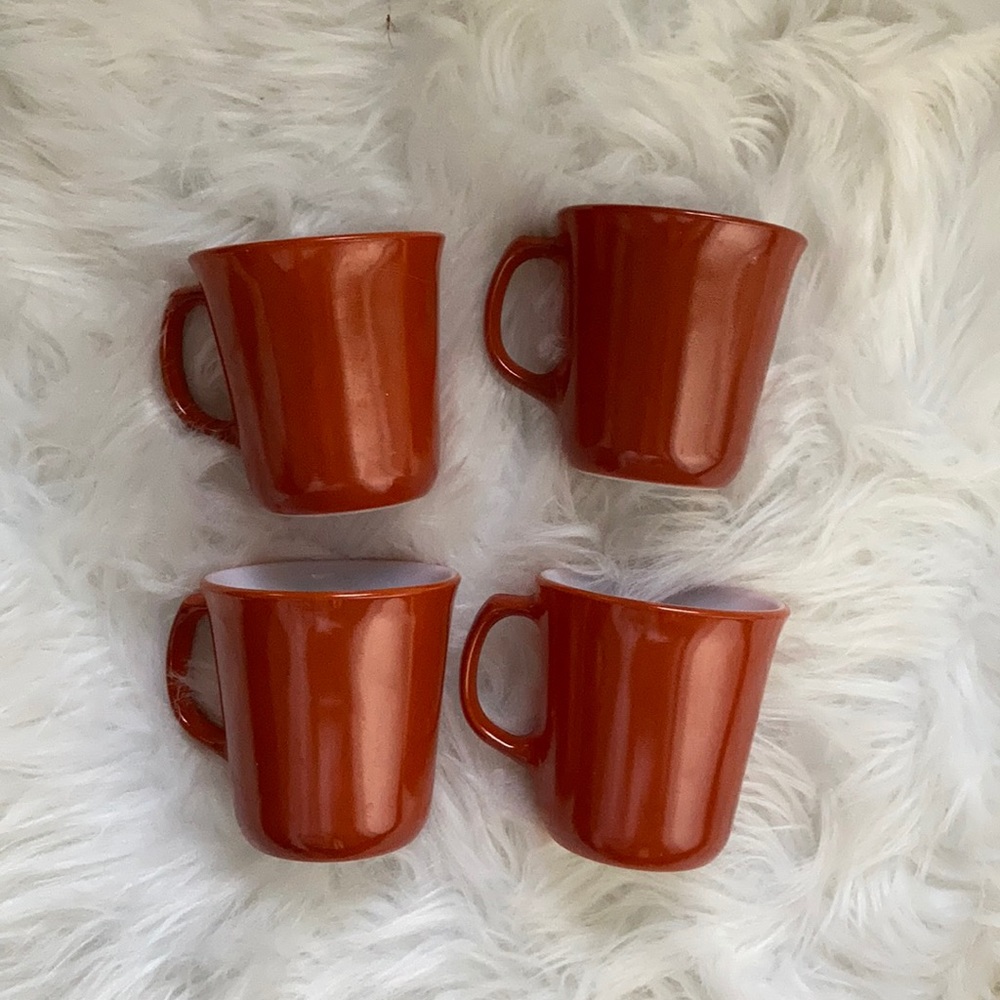 Set of 4 Vintage Pyrex mugs burnt orange w/case.